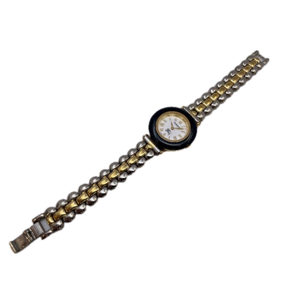 Burberry Bezel 9100L Quartz Analog Round Watch Currently Working