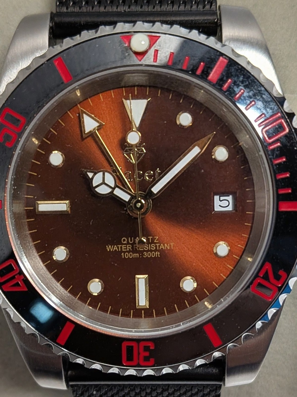 Facet GMT Milano with GMT movement and mesh braclet
