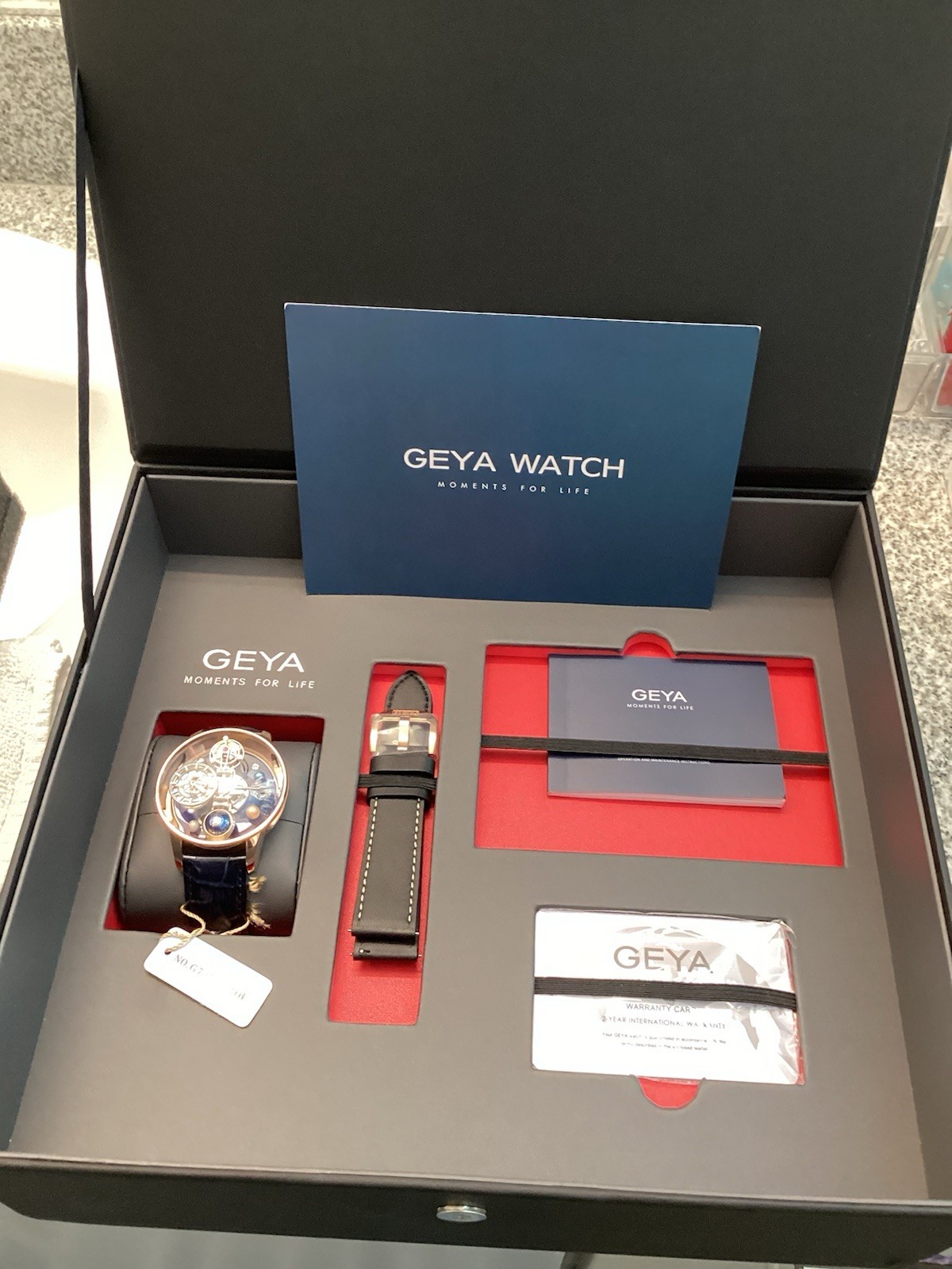 GEYA Men’s Automatic Skeleton Watch Blue Dial Gold Tone 44mm Box & Papers
