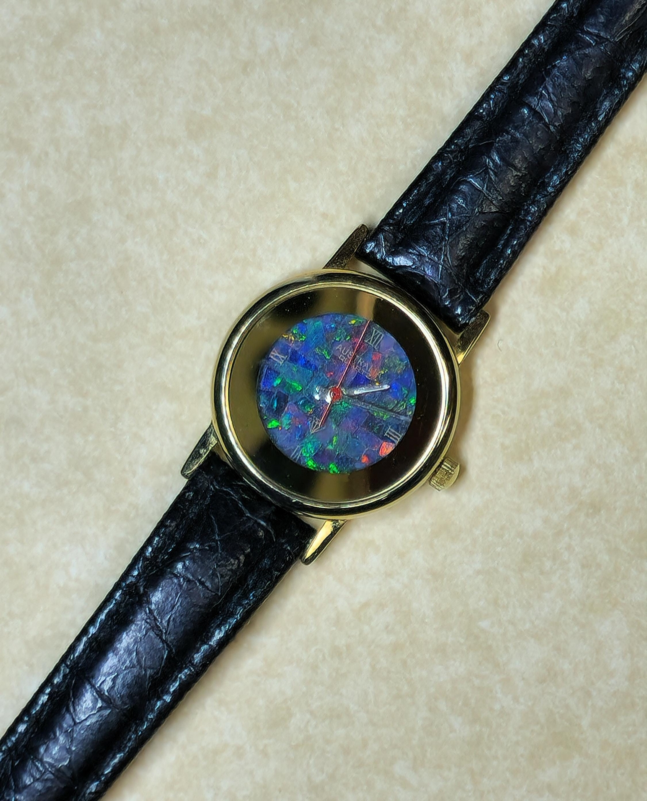 54181.0 – “Australia” Opal Watch with Natural Australian Opal Gold rim with no