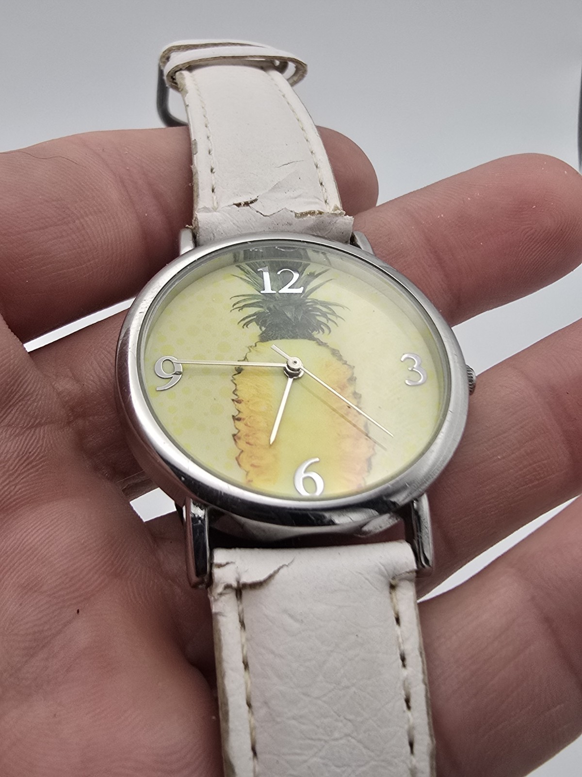 Avon Quartz Analog Wristwatch Pineapple Dial Silver SS Case White Leather Strap