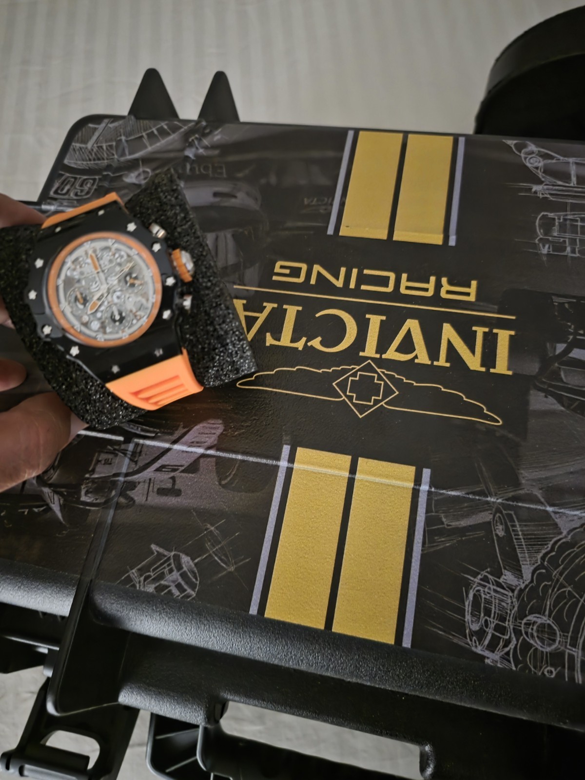 Invicta Racing Men’s Chronograph Quartz 44mm Black Case Orange Strap 100m