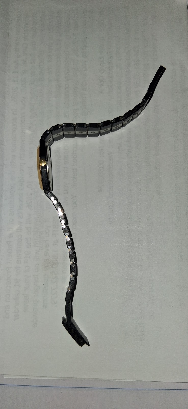 watch women mariner SG black and gold never worn really in like new condition