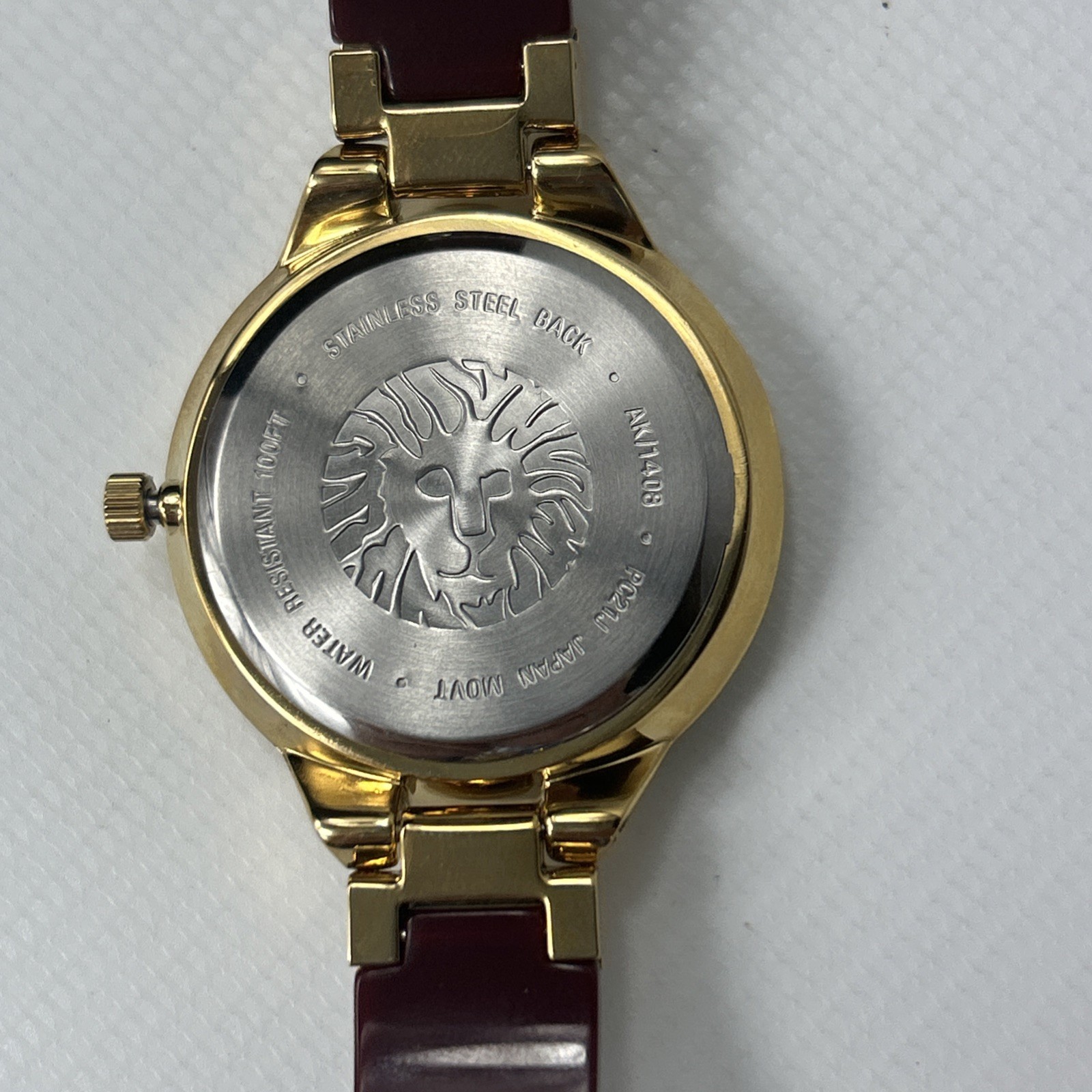 Anne Klein Women’s Quartz Burgundy Resin Gold-Tone Watch – AK/1408BYBY