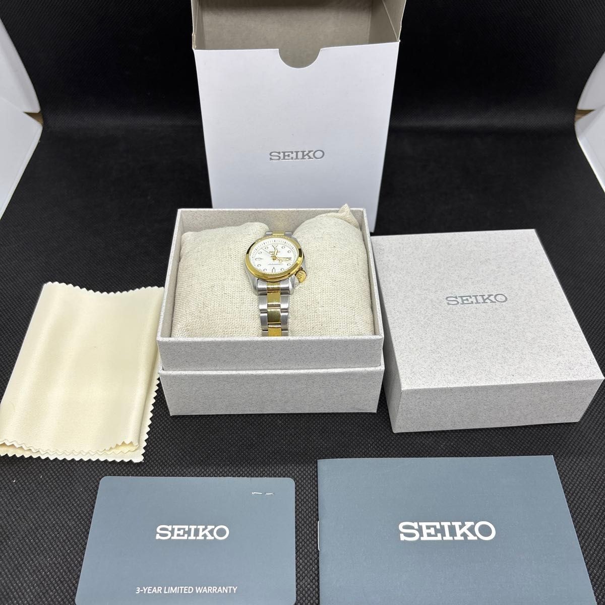 Seiko SRRA002 Auto Watch 10ATM Water Resistance White Dial Gold Bracelet Jewel
