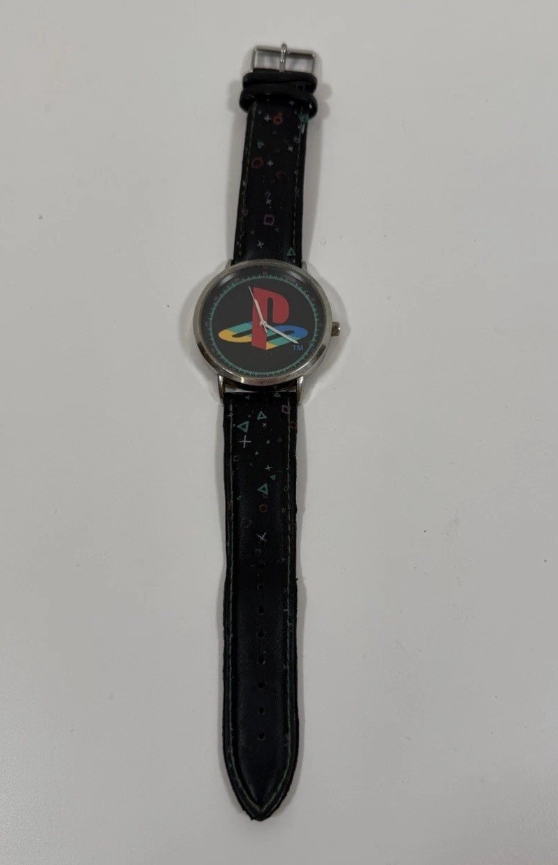 SONY PLAYSTATION LOGO QUARTZ WATCH WITH BLACK FAUX LEATHER STRAP NEEDS BATTERY