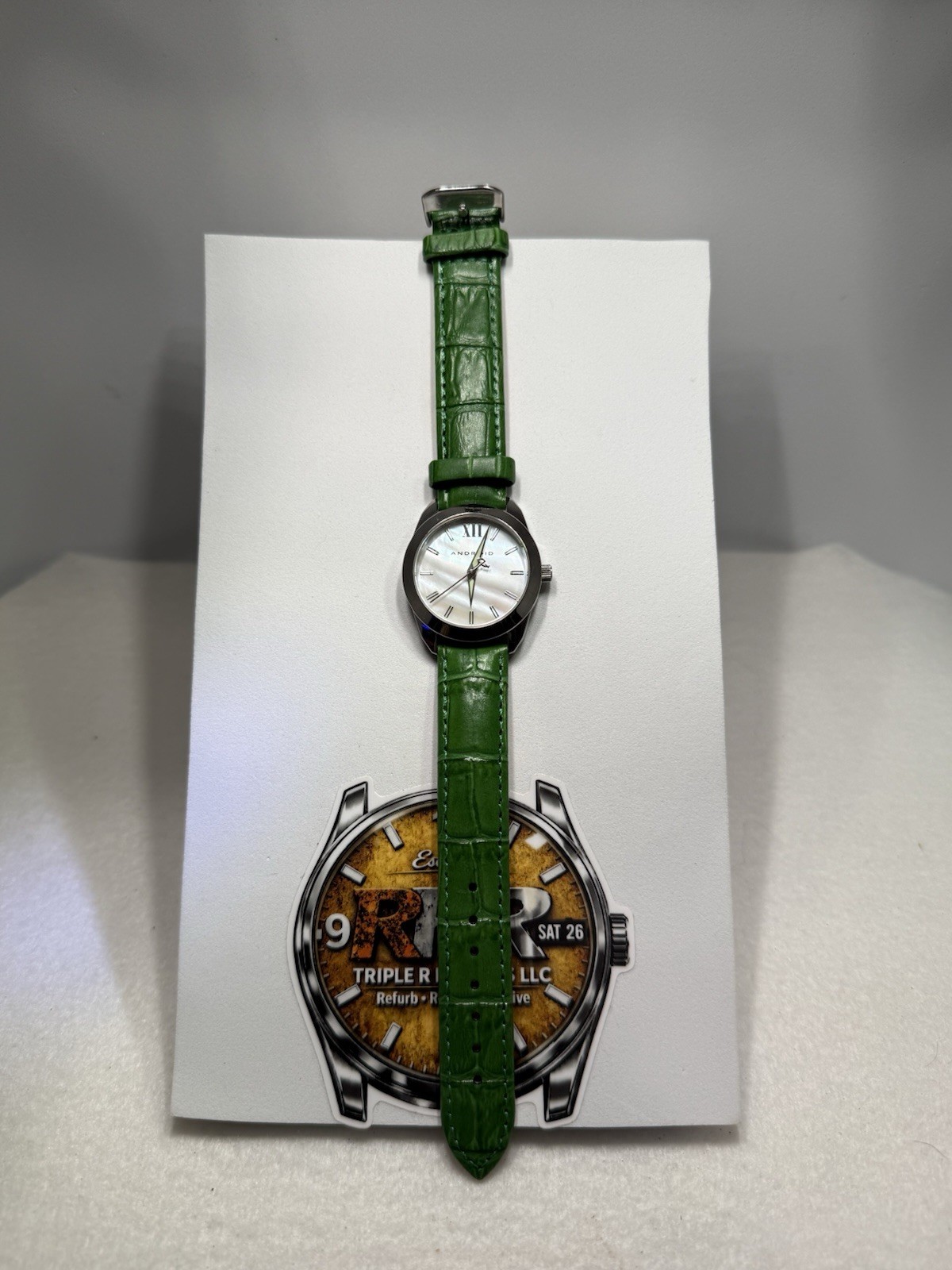 Android AD7 – MOP‑dial – green‑leather – stainless‑steel – quartz – 34.25mm
