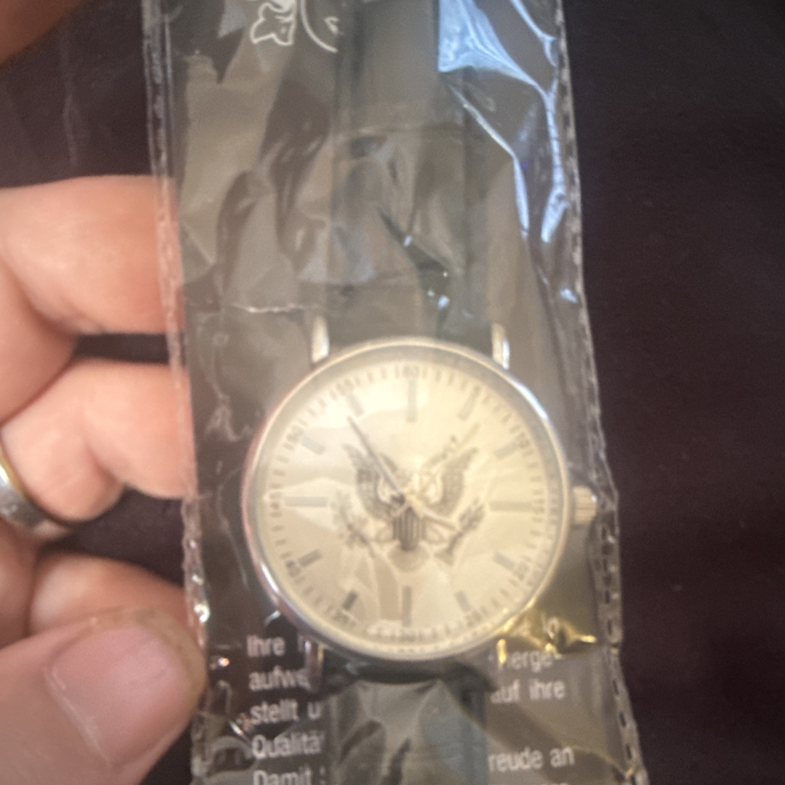 Analog Wristwatch White 12-Hour Dial Silver Stainless Steel Case Black Leather