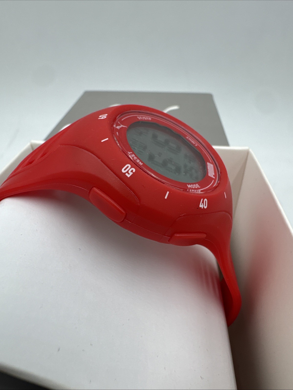 PUMA Women’s Puma 3 LCD, Red-Tone Polycarbonate Watch, P6023