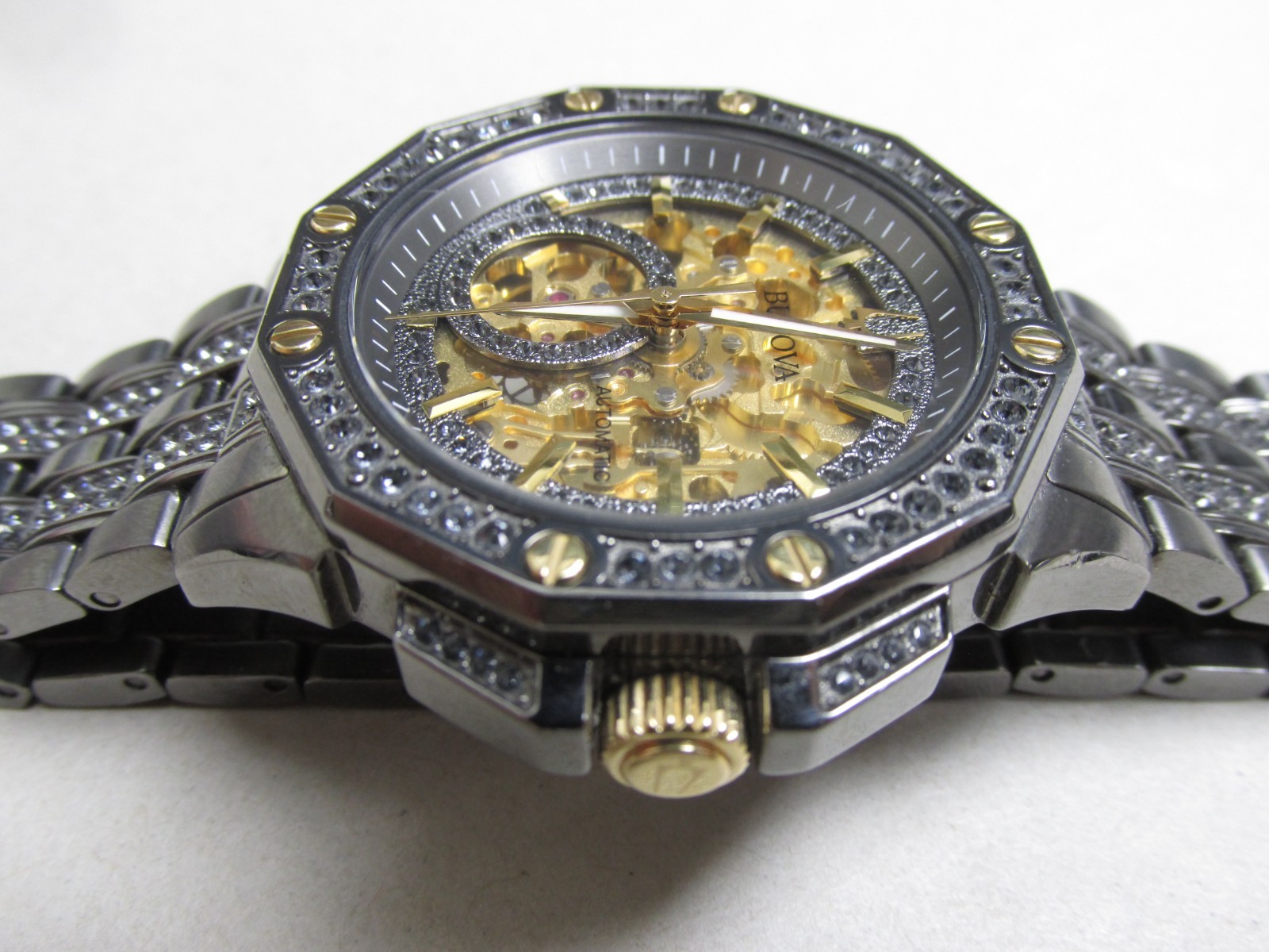 Bulova 98A293 Octava Automatic Gunmetal/Gold Skeleton Dial Men’s SS Watch