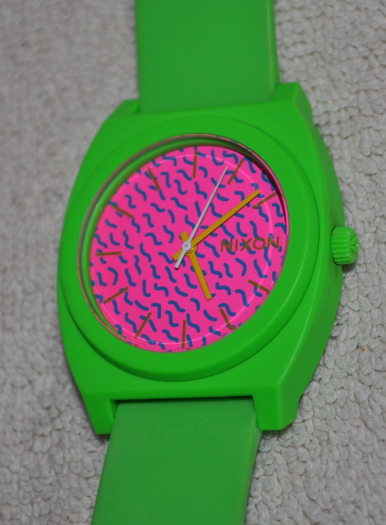 Nixon Time Teller P watch featuring a vibrant green polycarbonate case and strap