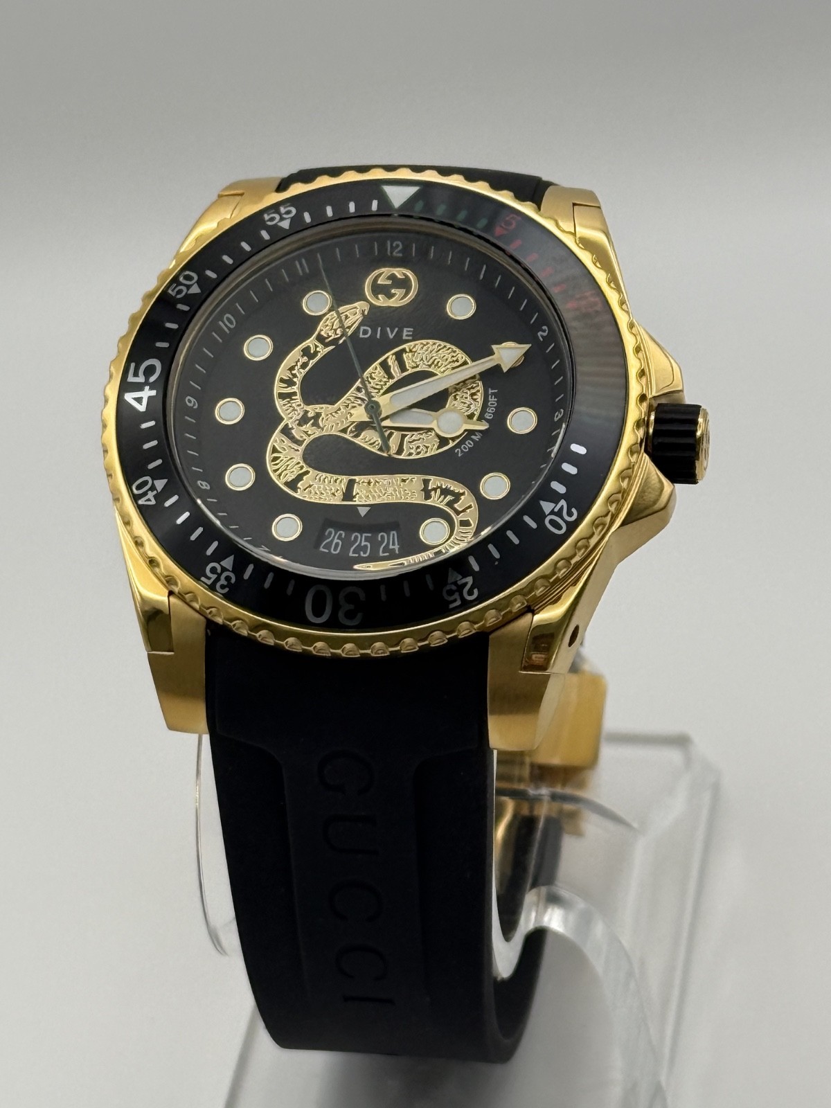 Gucci Dive Black Dial Gold-Tone Rubber Strap 45mm. Men’s Watch YA136219