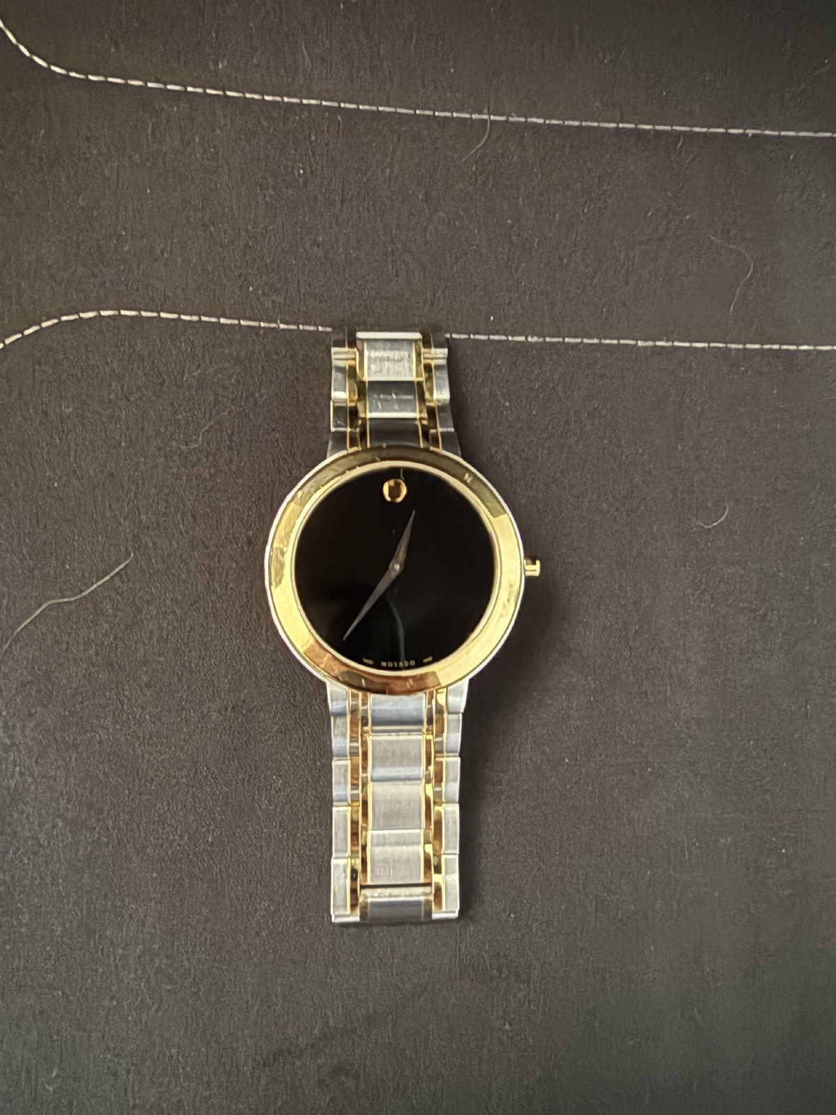Used Movado Stiri Yellow Gold Two Tone Black Dial Watch.