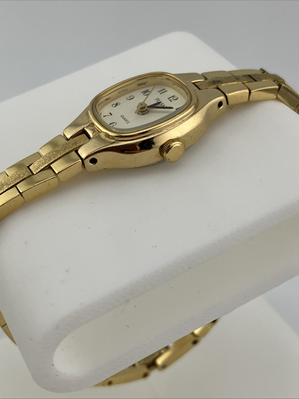 Vtg Pulsar Ladies 16mm Dainty Watch Gold Tone White Dial 6.25″ V811-5300 -RUNS