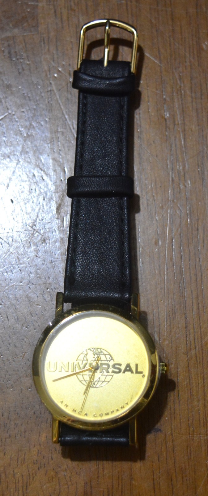 MCA/UNIVERSAL STUDIOS Wrist Watch Goldtone VHS Movie Promo 1990s