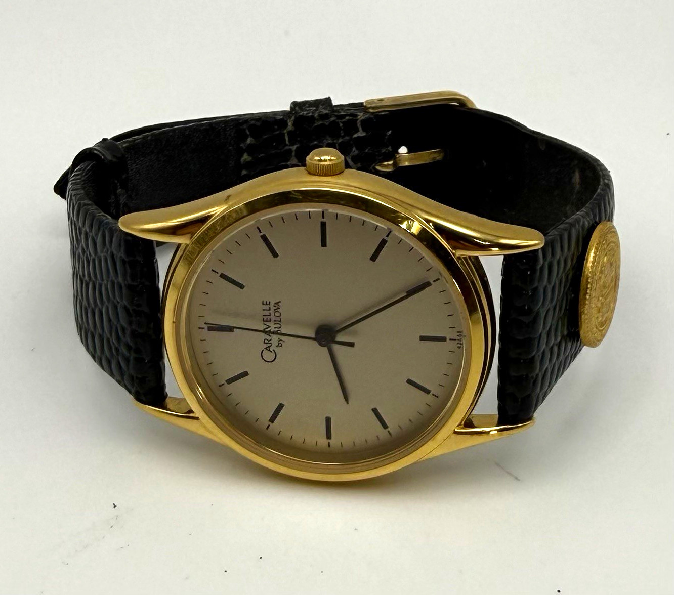 Bulova Caravelle Quartz Vintage Gold Tone Round Dress Watch Black Leather Strap