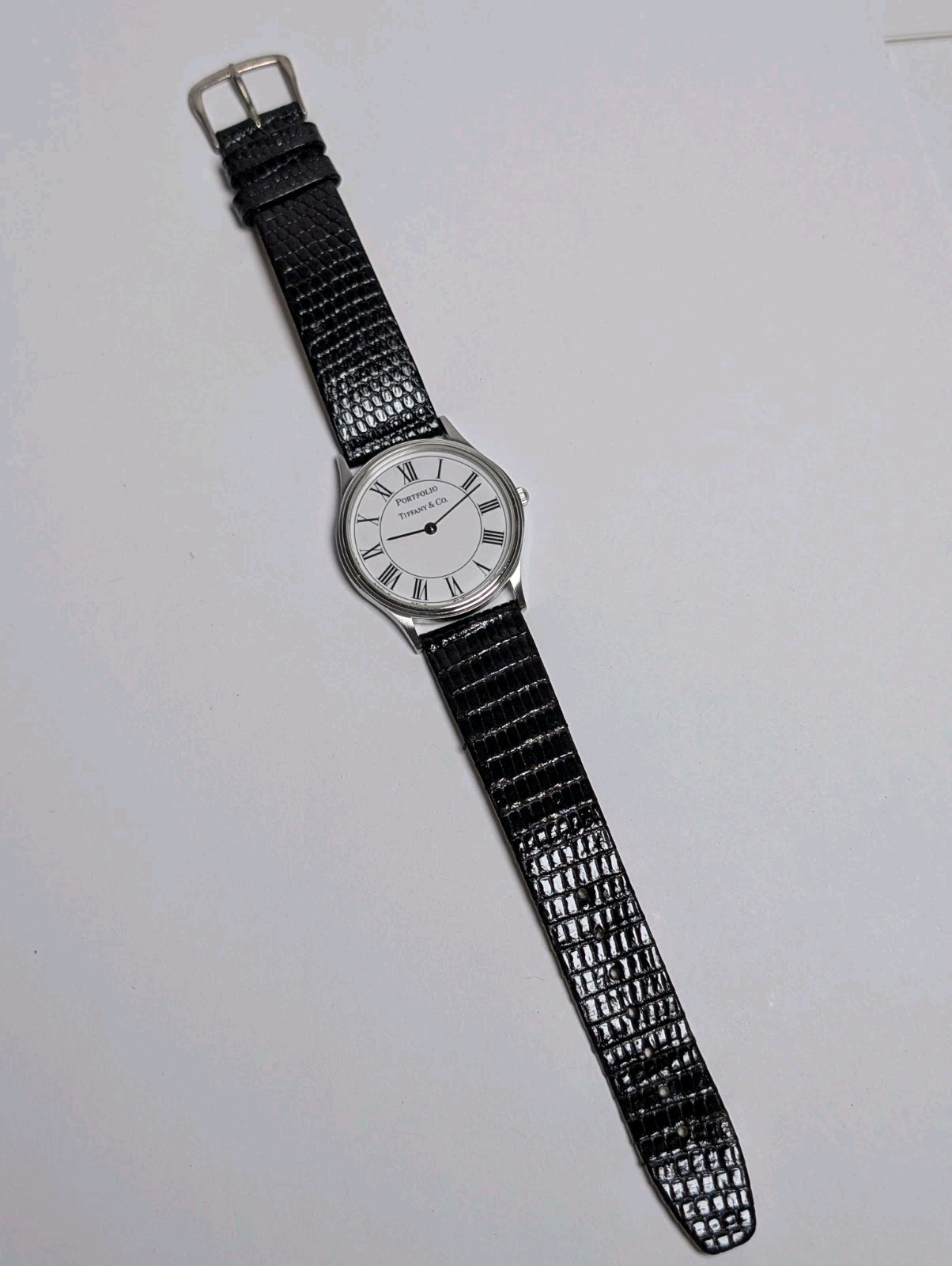 Vtg Tiffany & Co Portfolio Watch White Roman Dial Stainless Steel 33mm Swiss