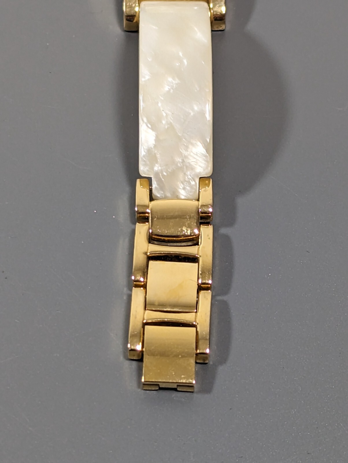 Massini Gold Tone Dial Rectangle Case White Band Watch