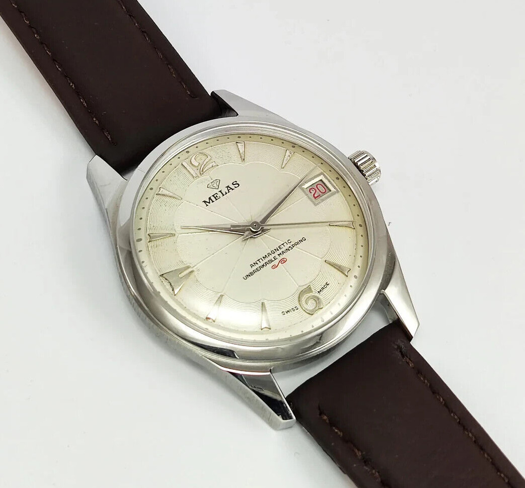 Working Melas Pearl Dial Date Function Handwinding Transparent Back Wrist Watch
