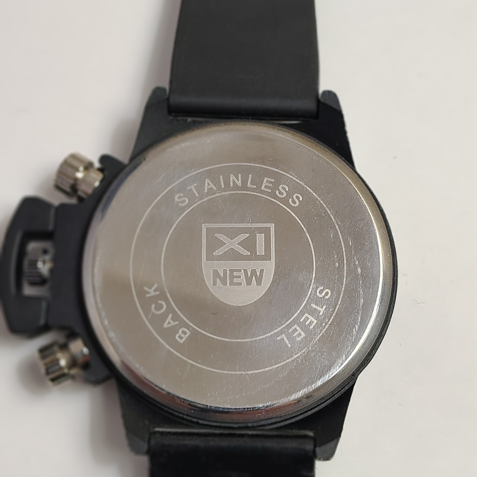 XINEW Mens watch Black Dial Date Quartz Japan Movt unique modern look