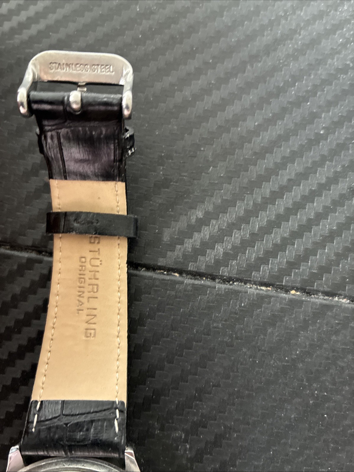 stuhrling original , water resistant, 2 years manufacturer Warranty