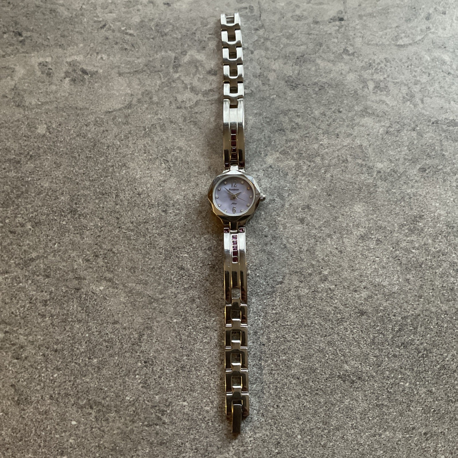 Beautiful Armitron Womens Watch 23mm Silver Tone Case/Band Purple MOP Dial Bin G