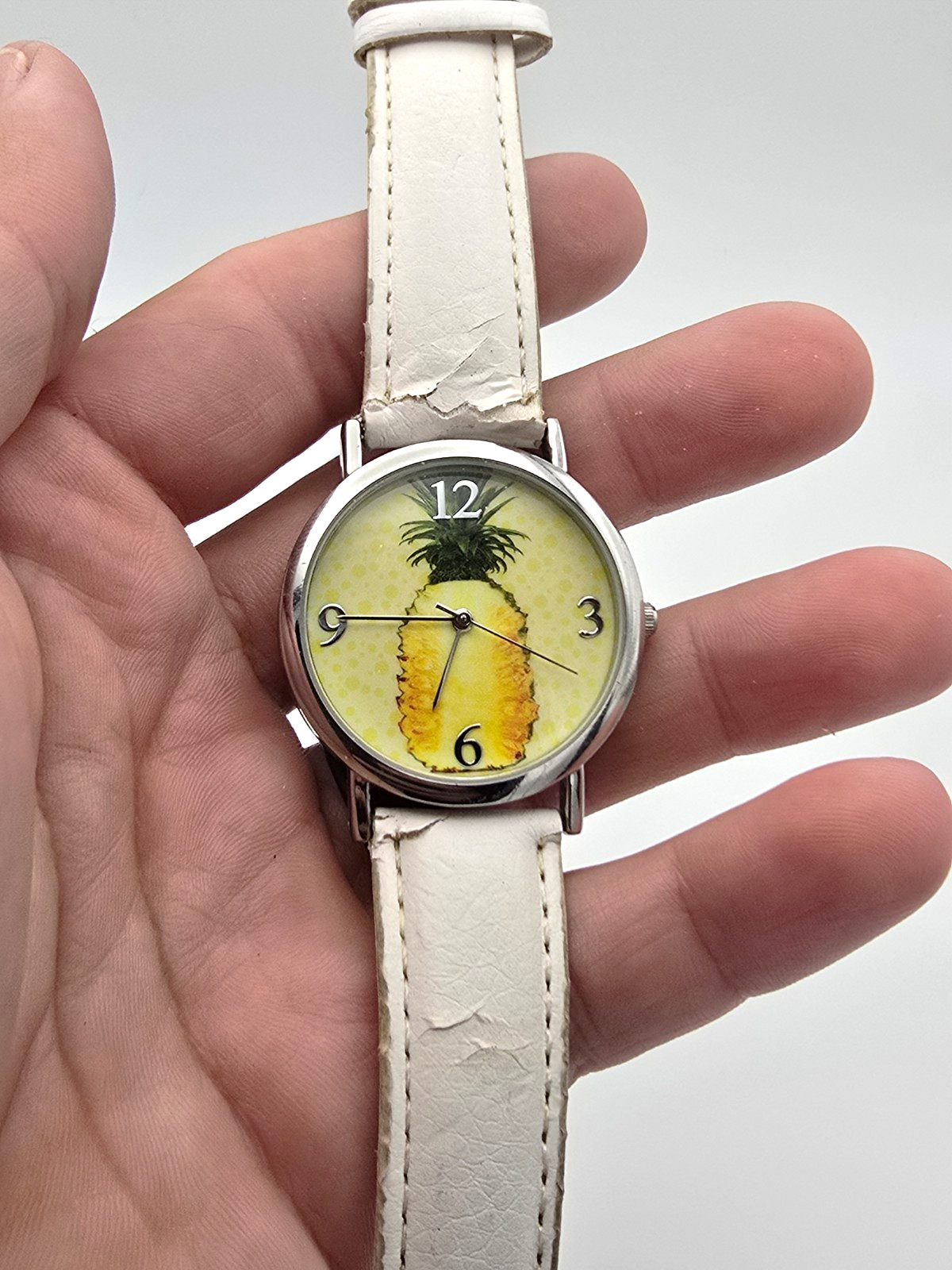 Avon Quartz Analog Wristwatch Pineapple Dial Silver SS Case White Leather Strap