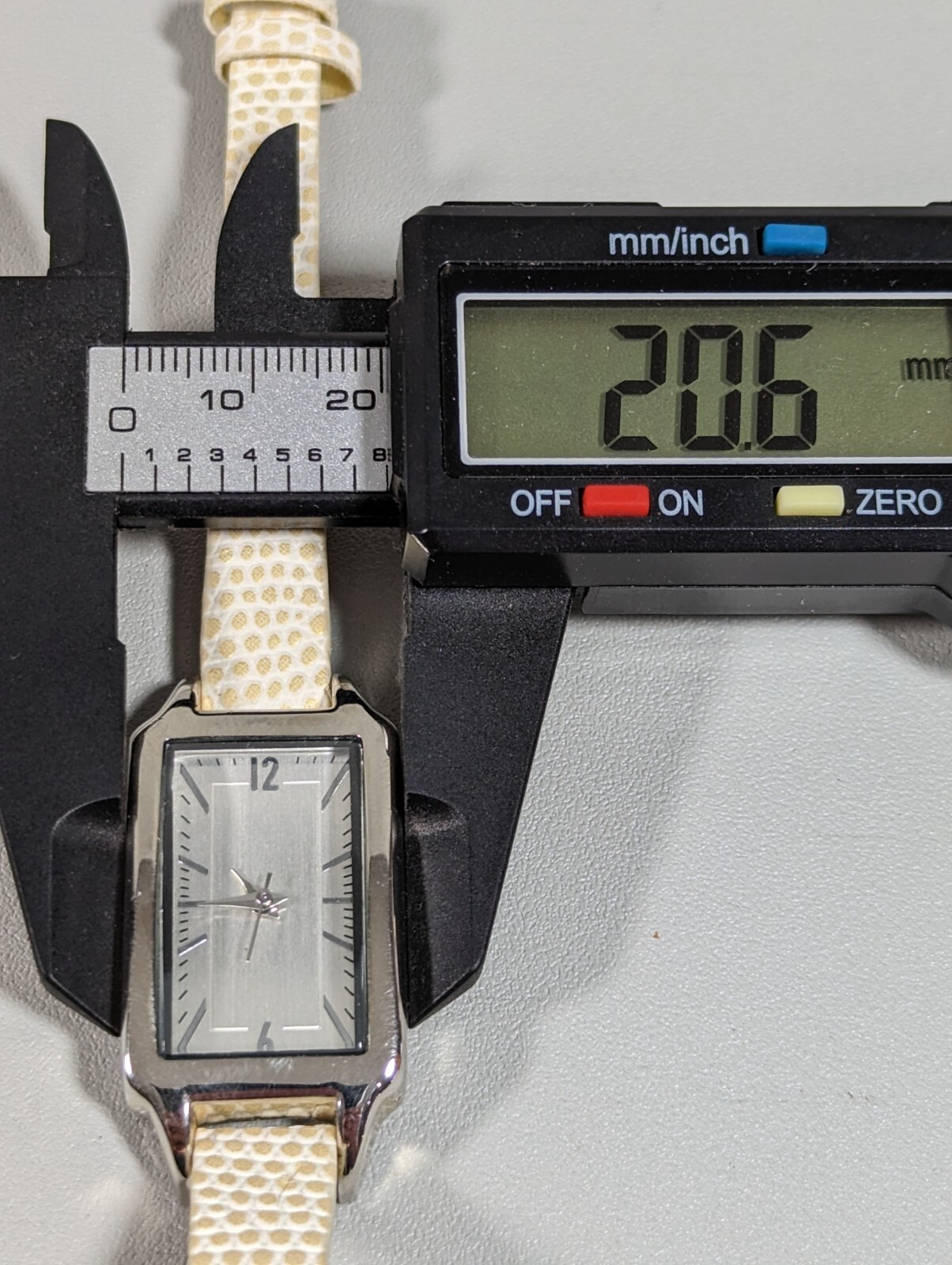 Silver Tone Dial Rectangle Case White Faux Leather Band Watch