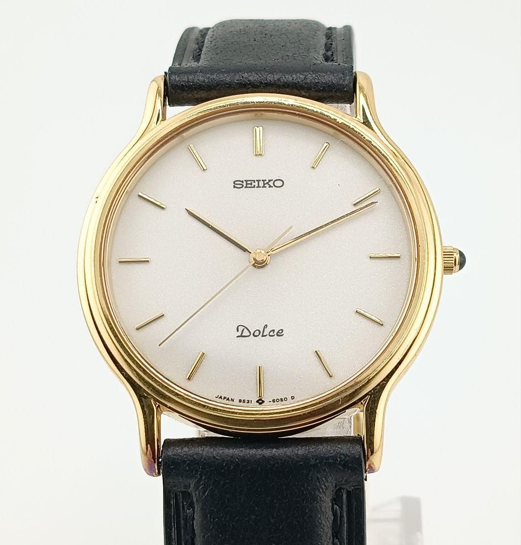 Excellent condition/working, new battery, SEIKO DOLCE watch, aftermarket strap,