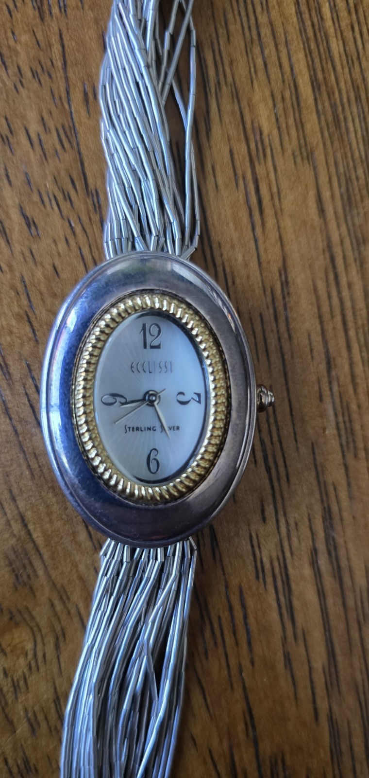 ECCLISSI Sterling Mother of Pearl Face Oval Case Liquid Silver 7.5″ Band Watch