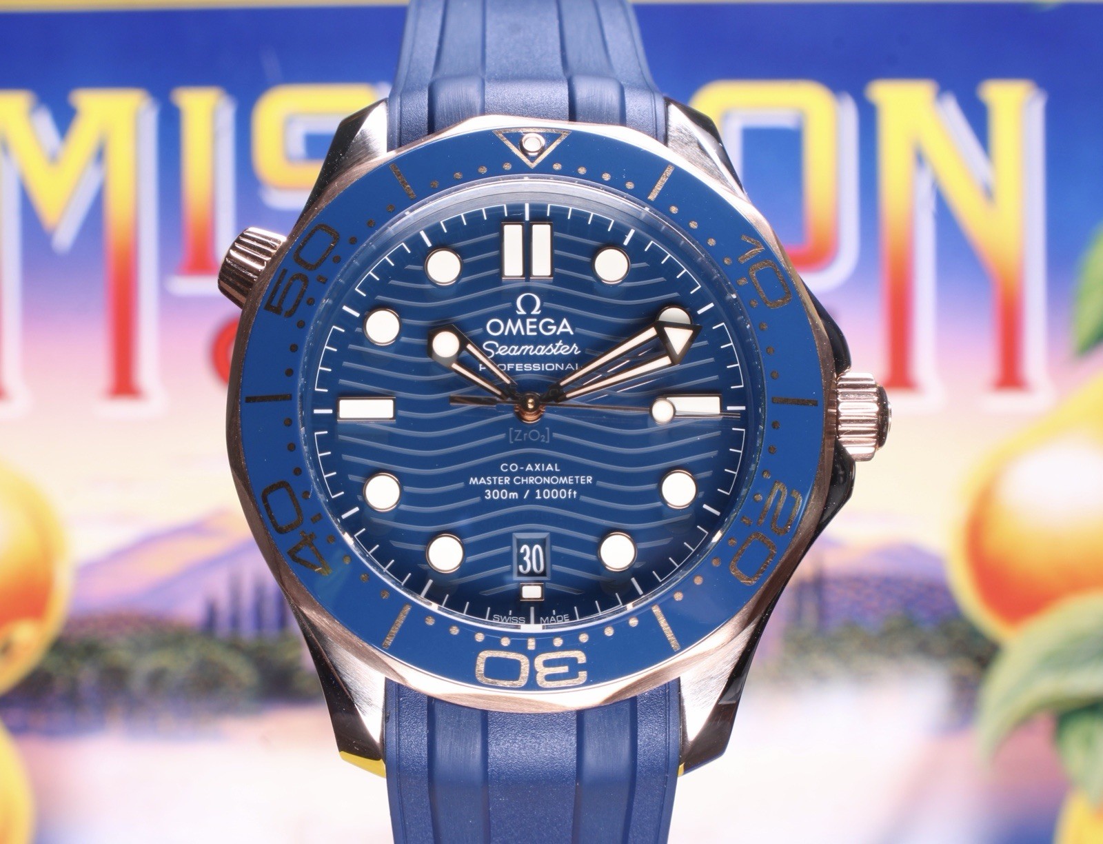 Omega Seamaster 300M Blue Wave Dial Sedna Gold Ceramic Bezel 210.22.42.20.03.002
