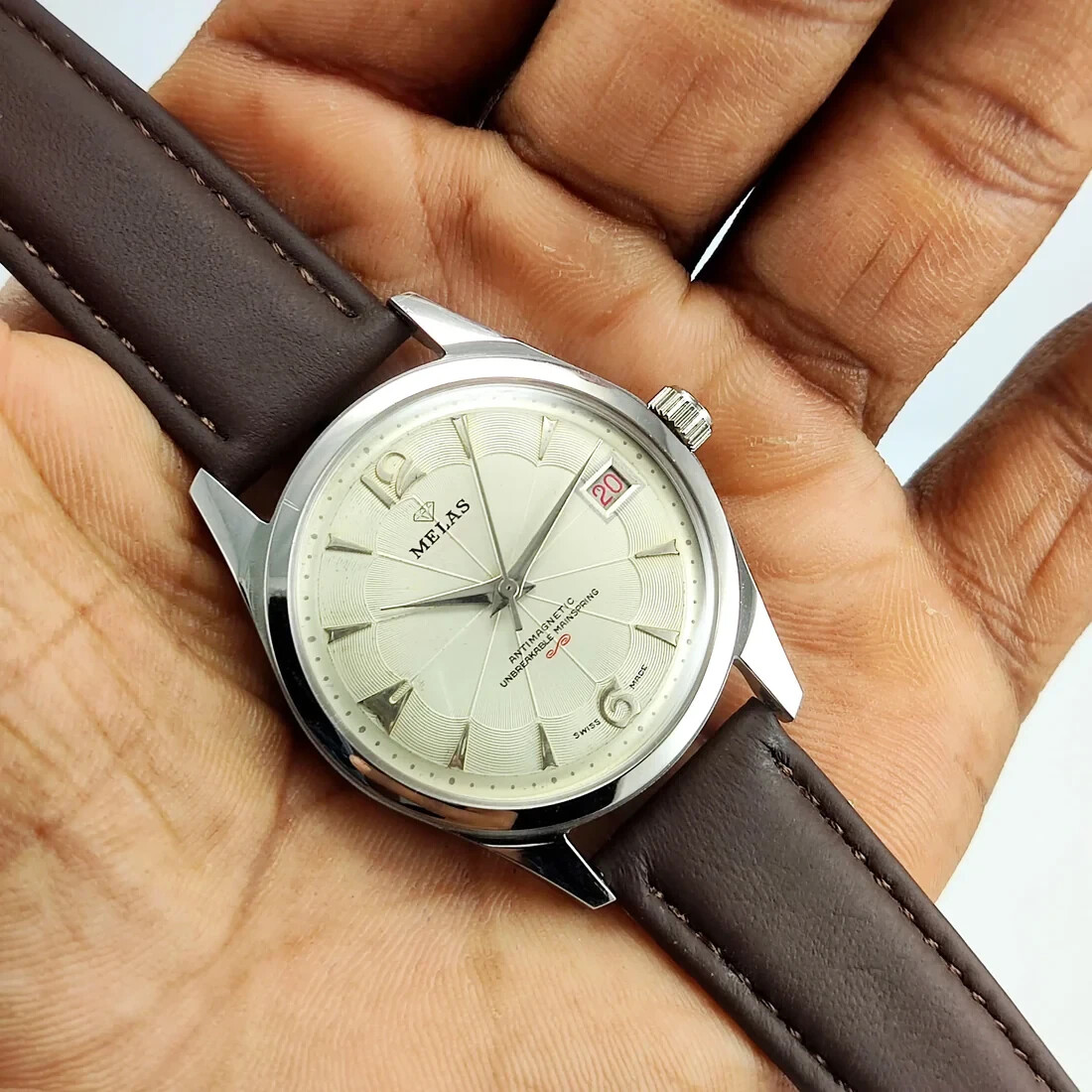 Working Melas Pearl Dial Date Function Handwinding Transparent Back Wrist Watch