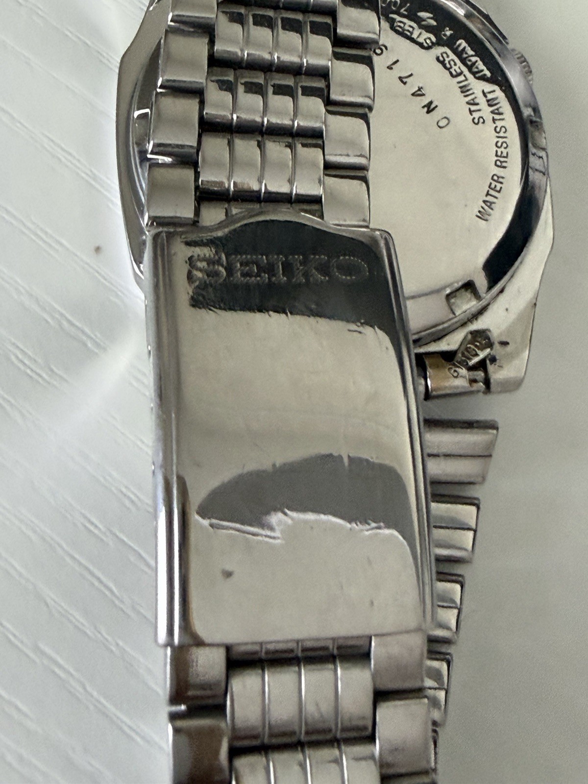 Seiko 5 Men’s Automatic 17J Day/Date Gold Dial Steel Bracelet Square Watch