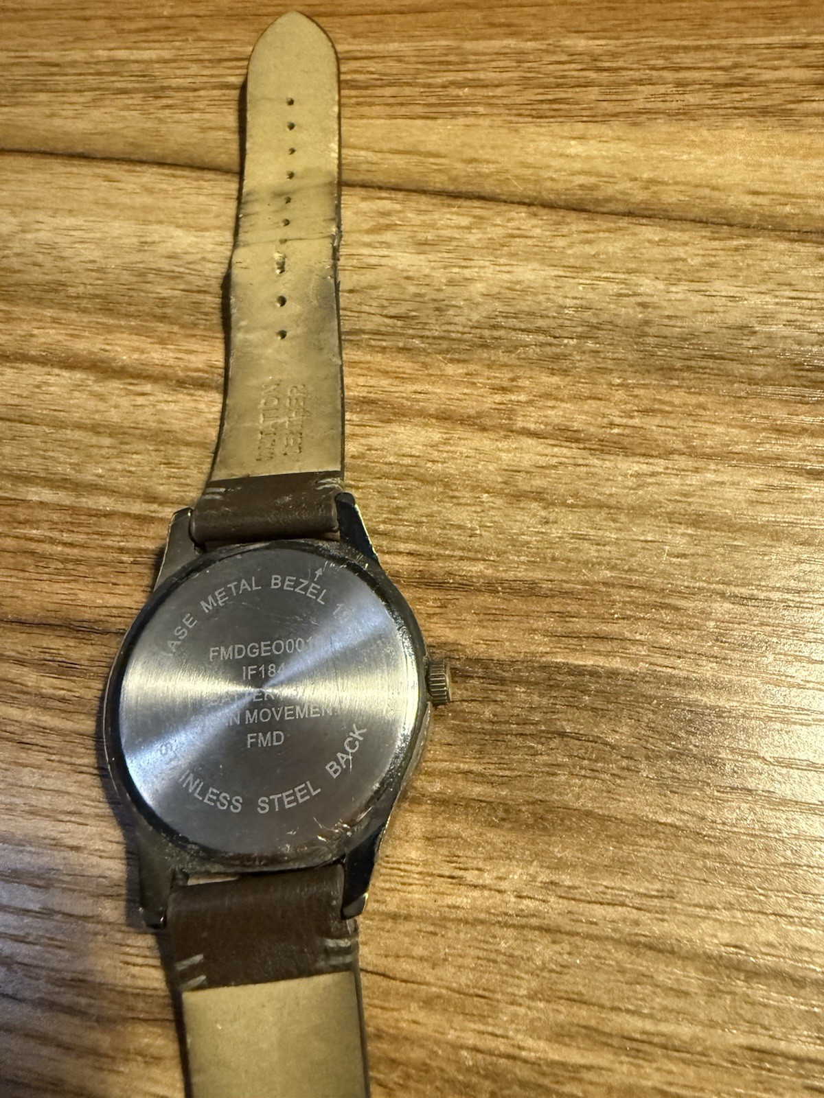Analog Wristwatch White Dial Arabic Numerals Brown Leather Strap Black Case