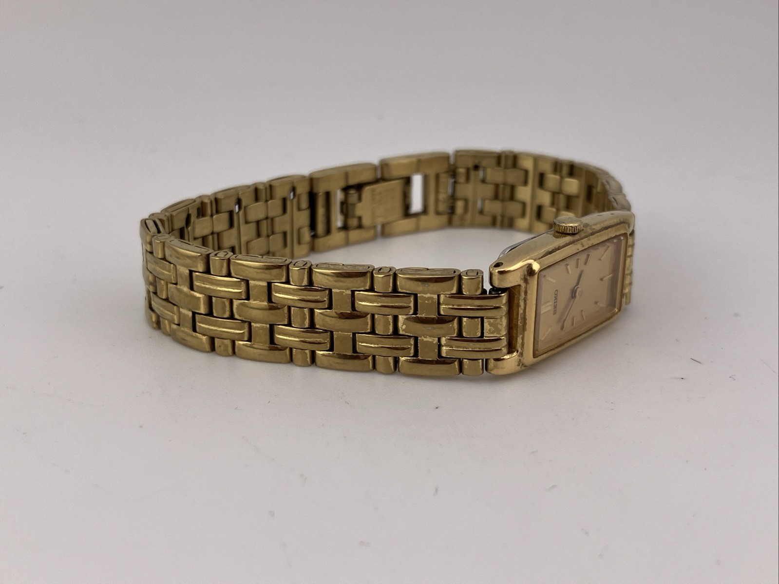 Vtg Seiko Ladies 13mm Watch Gold Tone Gold Tank Dial 5.75″ 2e20-7021 – RUNS