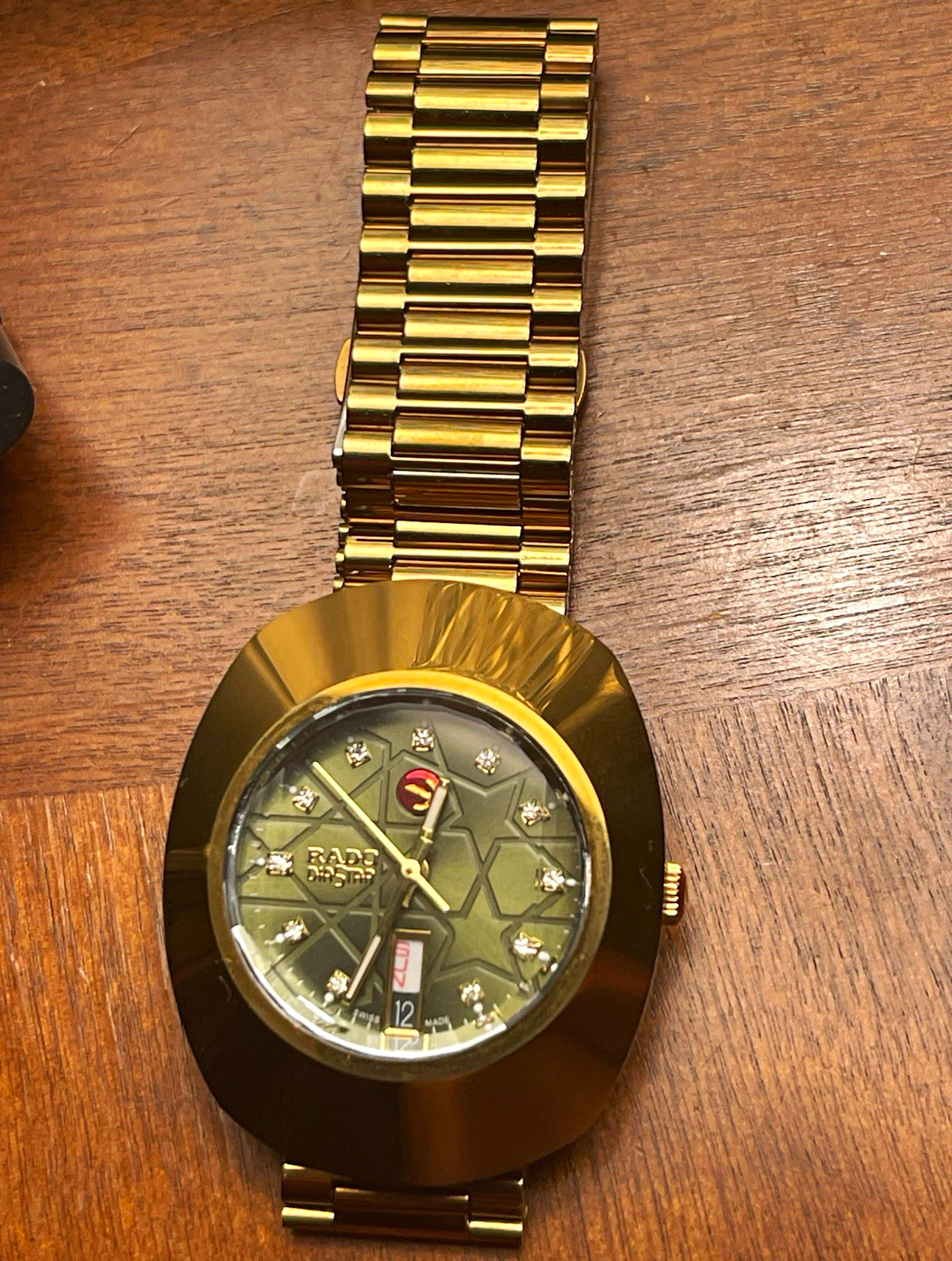 Rado DiaStar automatic Date , Oval Gold Tone Bracelet Watch Diamond Markers