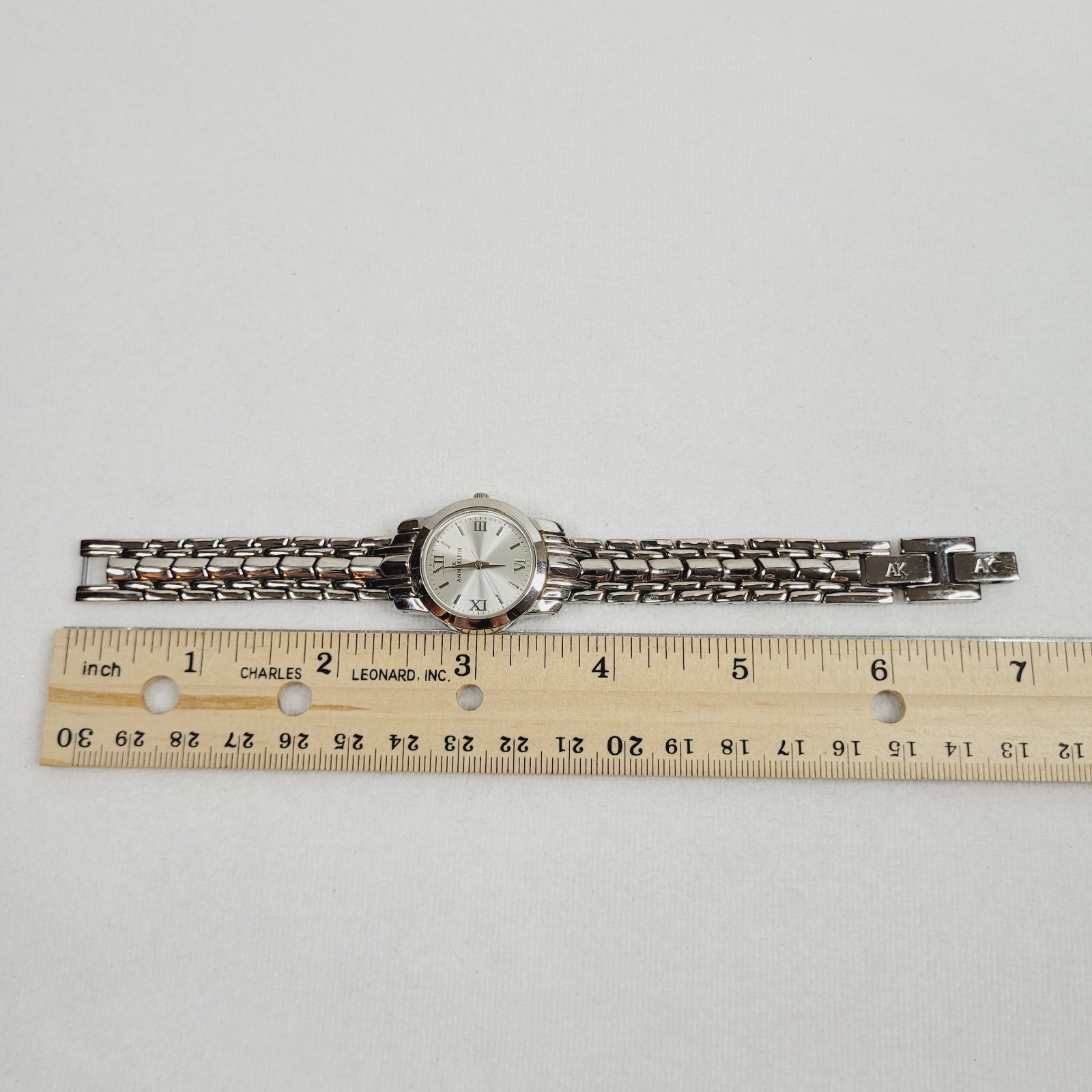 Anne Klein Bracelet Watch Silver Tone White Face Quartz Working Folding Clasp 7″