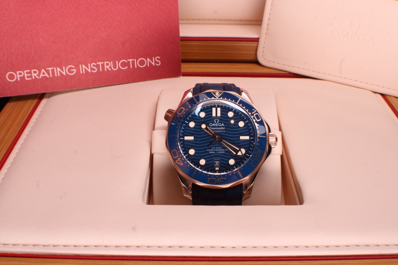 Omega Seamaster 300M Blue Wave Dial Sedna Gold Ceramic Bezel 210.22.42.20.03.002