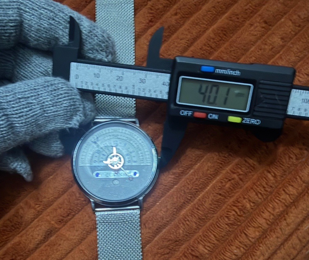 OUKESHI Orbit Dial Quartz Watch Mens Moon and Stars Pointer Steel Mesh Band