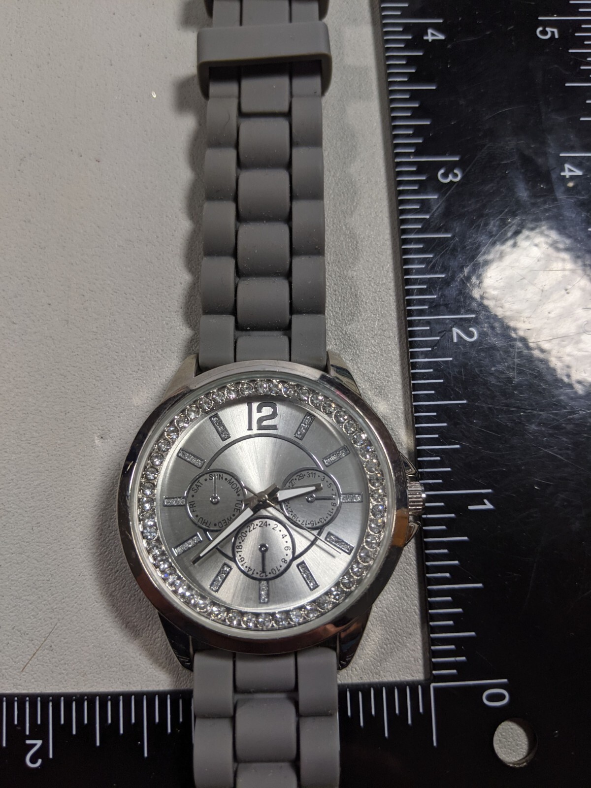 Silver Tone Dial Round Crystal Accent Case38 mm Gray Rubber Band Watch