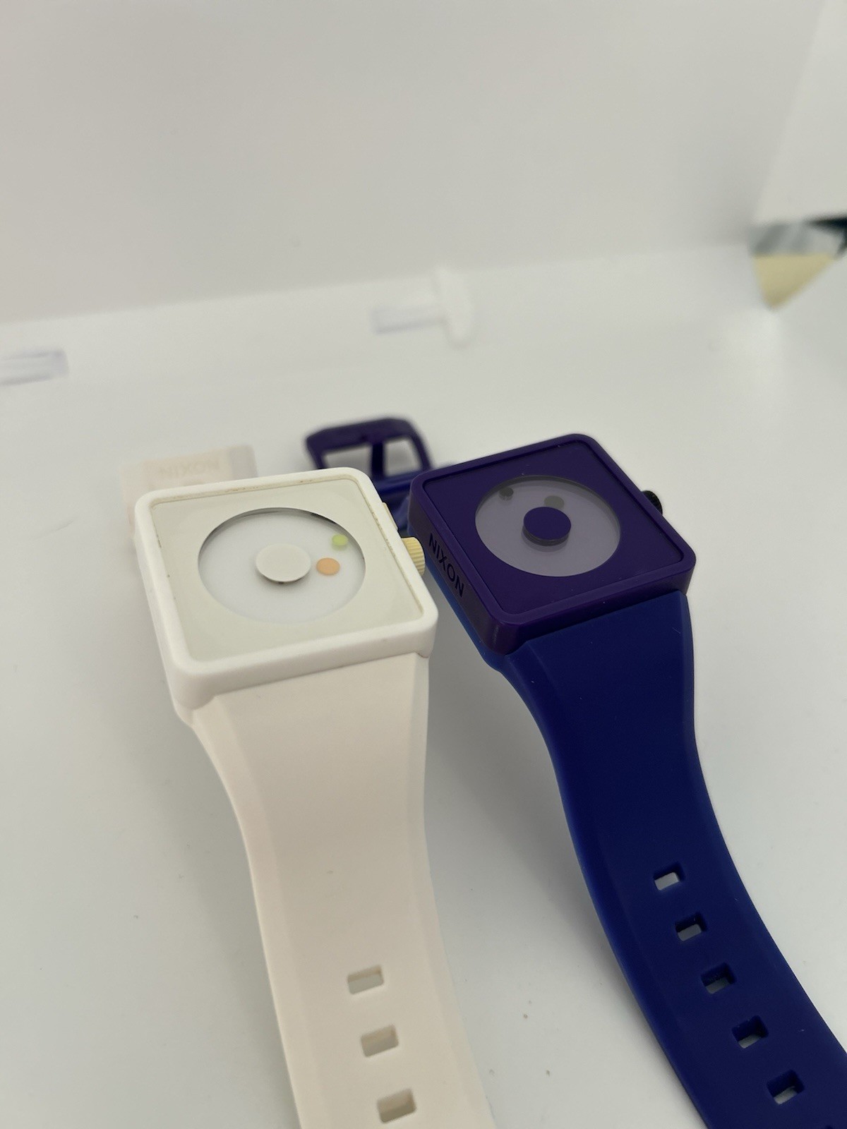 Two Nixon Float On The Newton Watch Purple And Blue And White