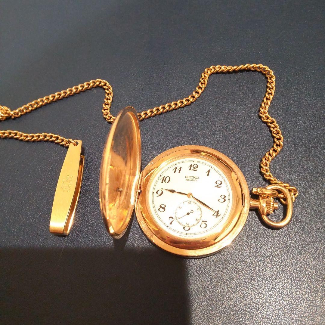 SEIKO pocket watch, gold color, with chain.