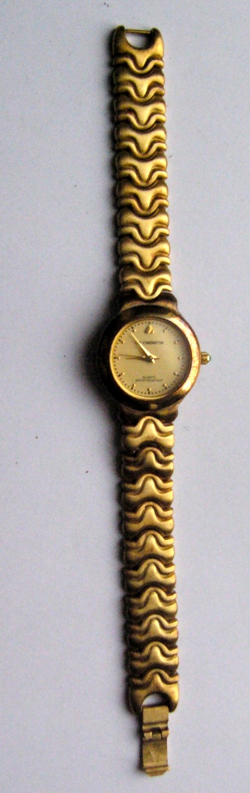 VINTAGE LIZ CLAIBORNE GOLD WAVE BRACELET, SMALL ROUND WATCH