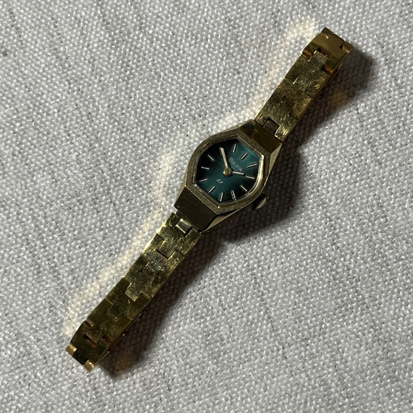 Ladies 16mm Bulova 23J Gold Tone Manual Wind Watch Green Dial 6 1/4” Running