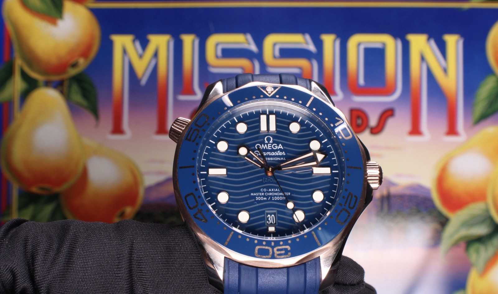 Omega Seamaster 300M Blue Wave Dial Sedna Gold Ceramic Bezel 210.22.42.20.03.002