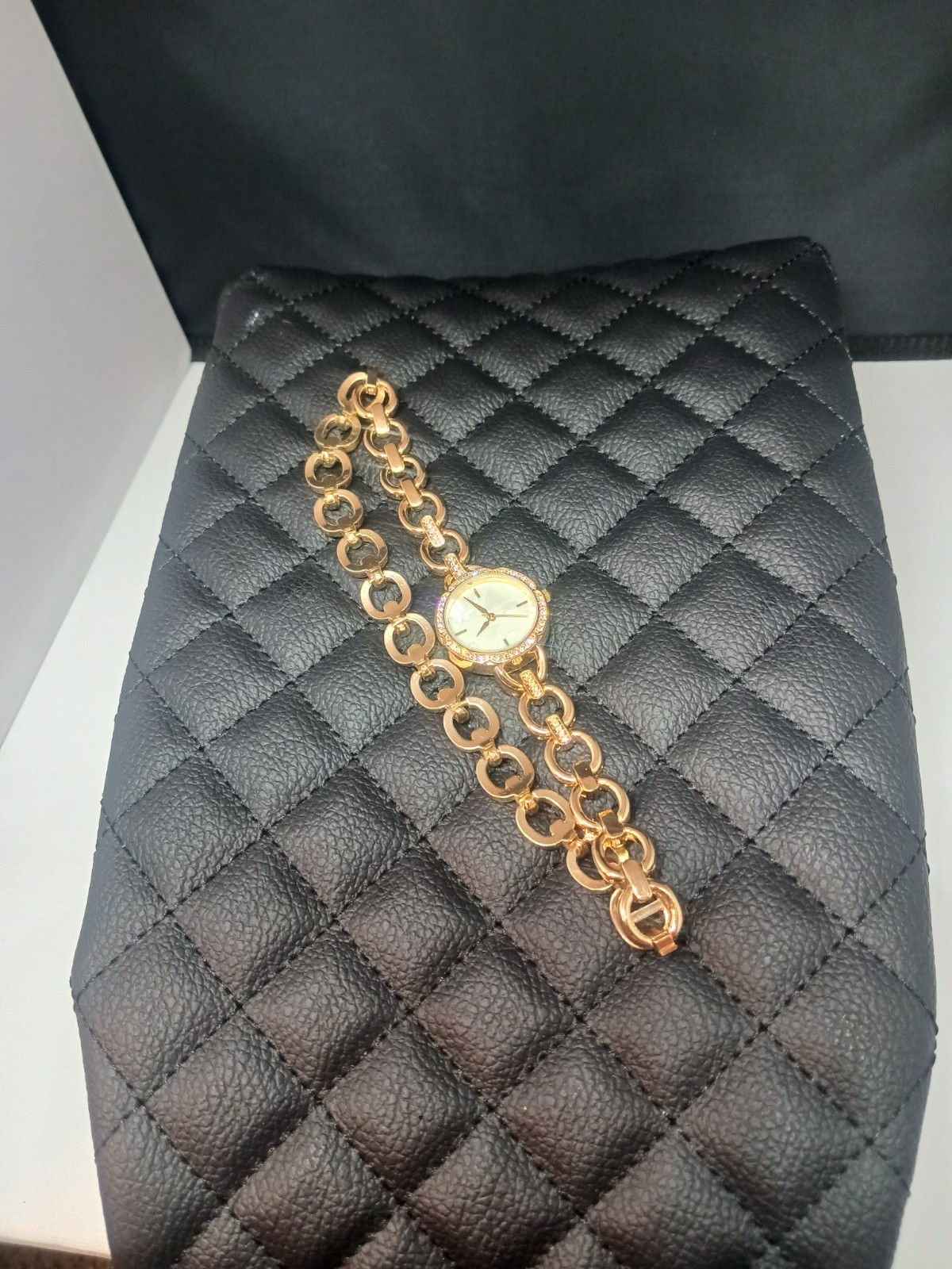 Fashion watch gold tone with clear rhinestones. Long wraparound chain to be used