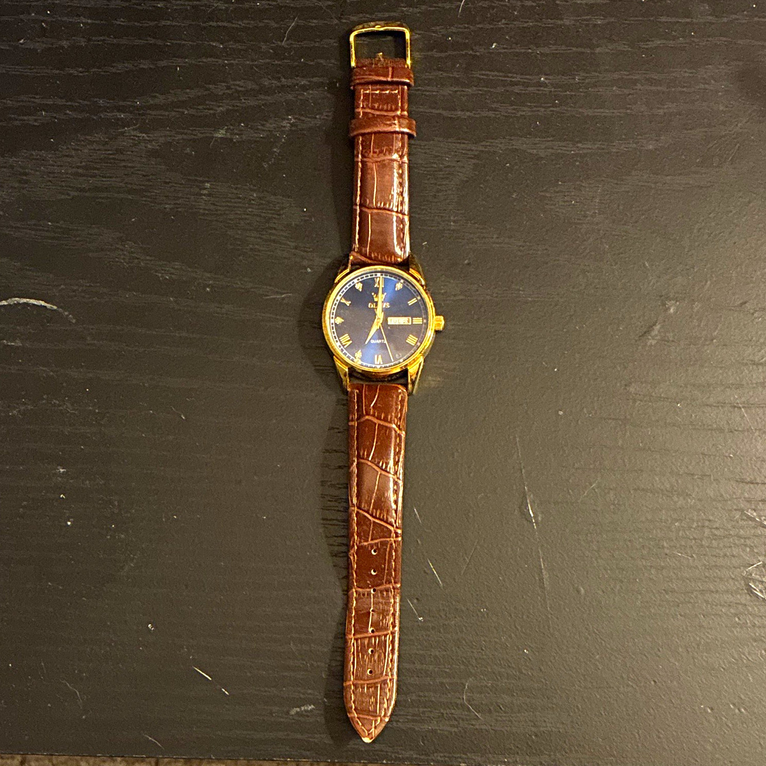 OLEVS Men’s Quartz Day/Date Blue Roman Dial Gold SS Watch Brown Leather Strap