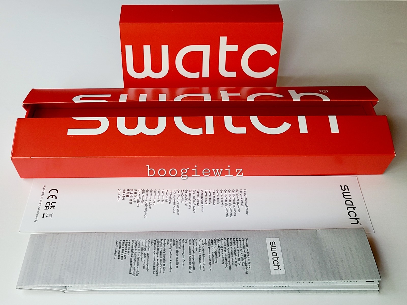 SWATCH, SWISS MADE, CLK WISE LARGE ASSORTED NUMBERS, SU0W117, NEW IN BOX