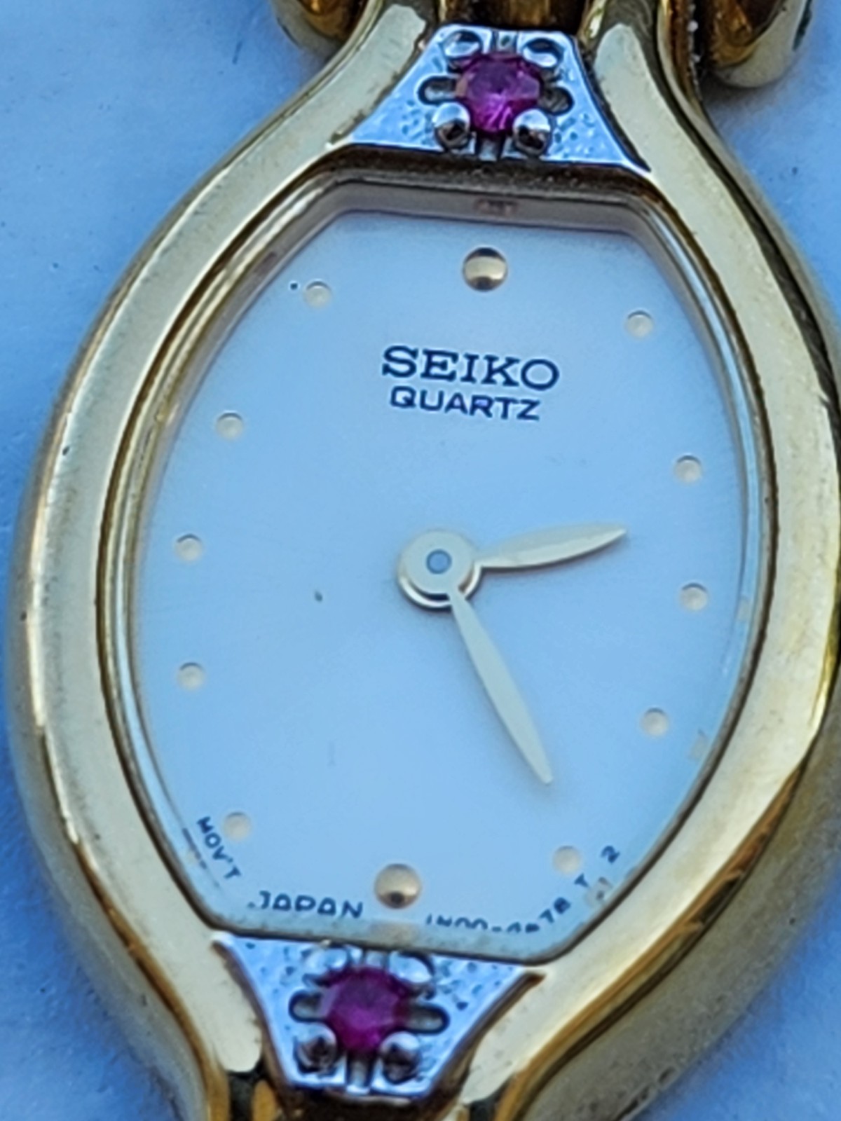 *Vintage* Seiko Ruby Bracelet Watch with Gold-tone Oval Case 6.5″ Ivory Dial