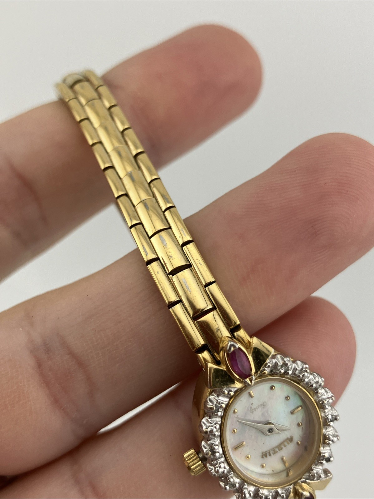 Vtg Austin Lades 17mm Watch Gold Tone Diamond & Ruby Bezel MOP Dial 5.75″ – RUNS